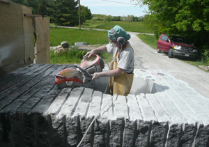 jon hudson with a saw